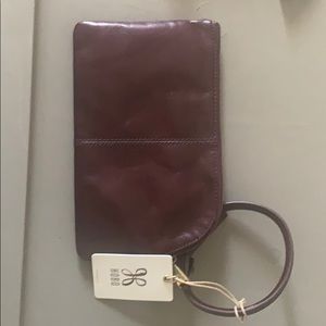 Leather clutch  Approximately 6 x 9.